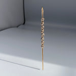 Nexus Needle 14k gold modern earring 