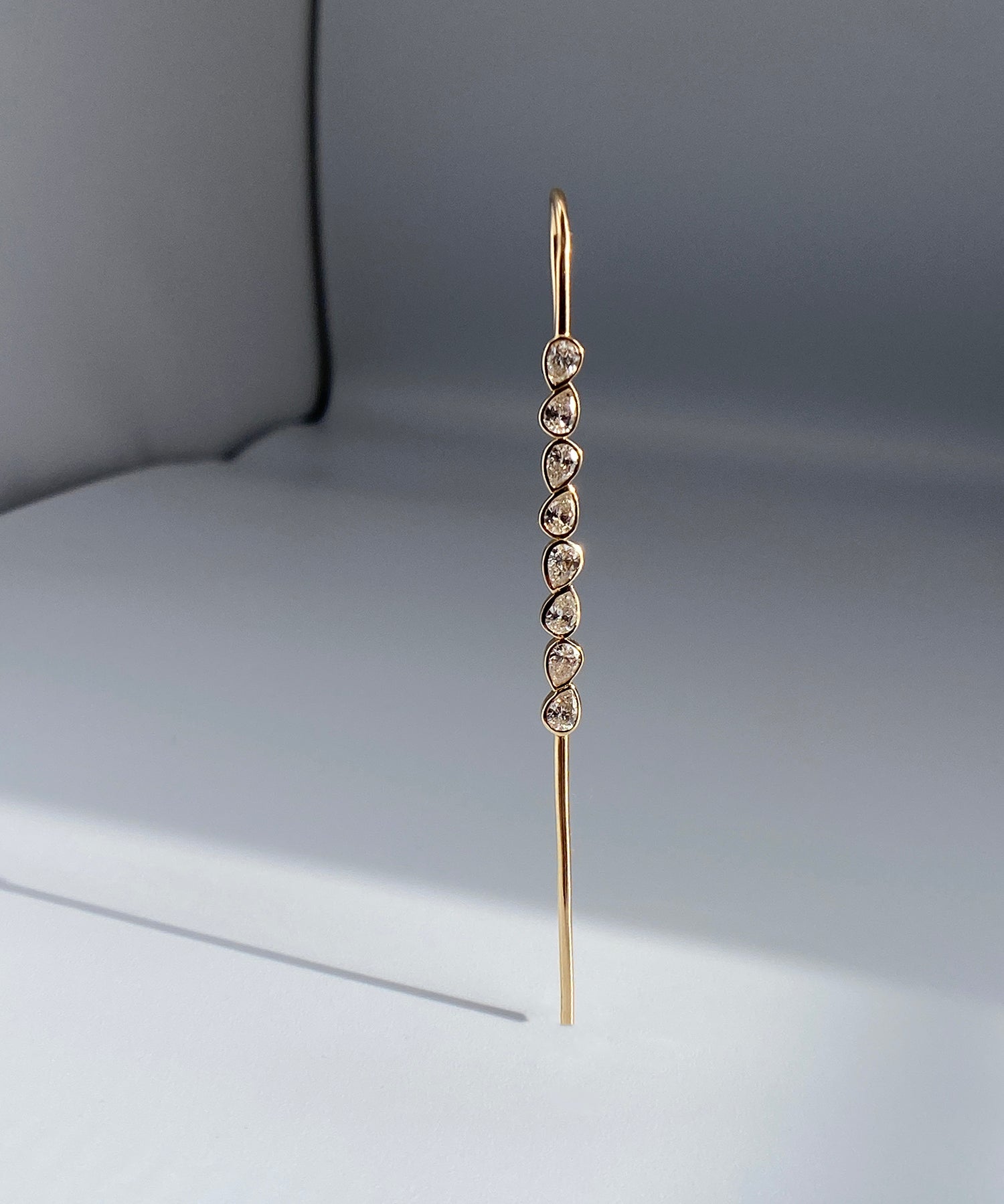 Nexus Needle 14k gold modern earring 