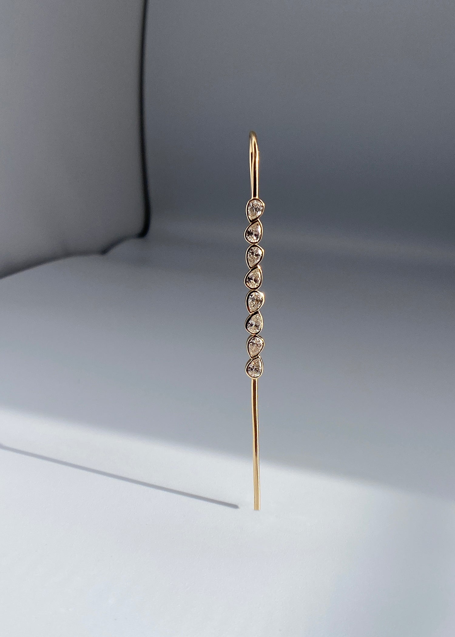 Nexus Needle 14k gold modern earring 